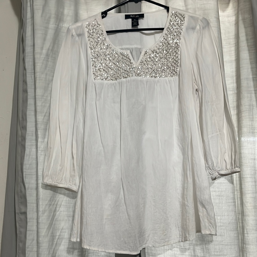 Beautiful sheer chiffon style blouse.